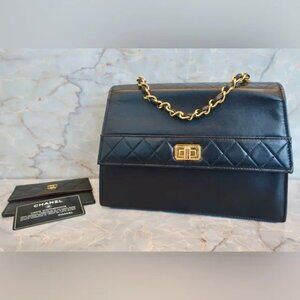 Authentic CHANEL 2.55 Trapezoid vintage black lambskin bag circa 1989 with pouch